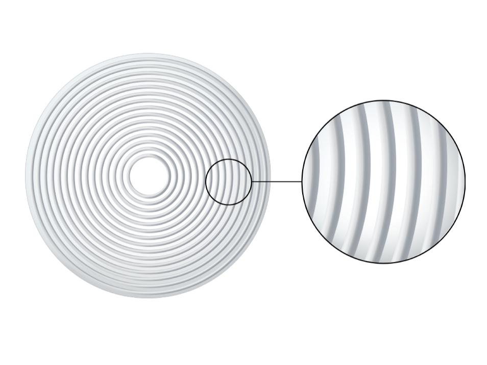 Illustrasjon av et ZEISS MyoCare-glass med C.A.R.E.-elementer som skaper ufokuserte soner for å bremse progresjon av nærsynthet.